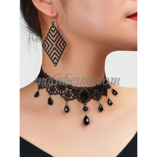 Set of black necklace and earrings with black pearls