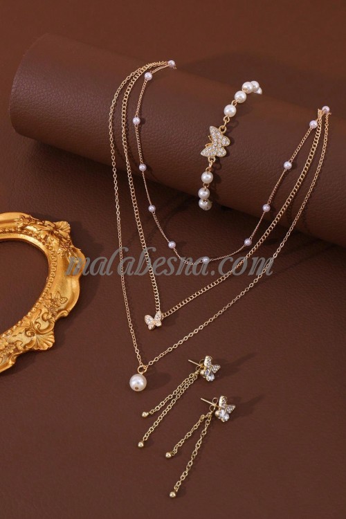3 Pieces golden set of necklace earrings and bracelet with butterfly and white pearls