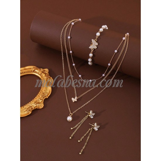 3 Pieces golden set of necklace earrings and bracelet with butterfly and white pearls