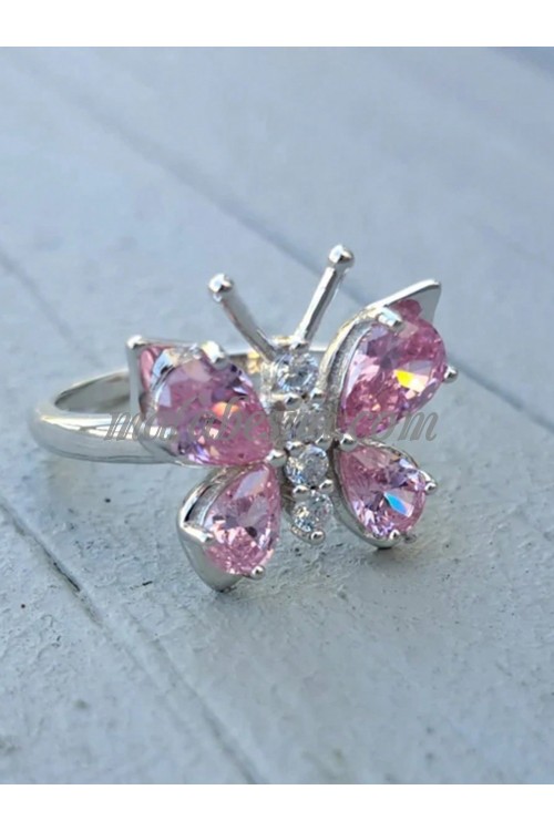 Silver ring with butterfly and pink on its wings