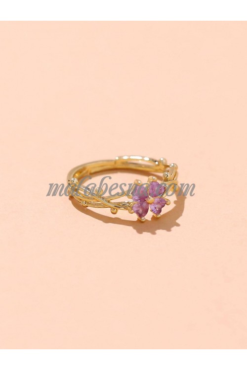 Golden Ring with purple flower