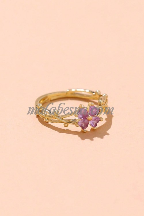 Golden Ring with purple flower