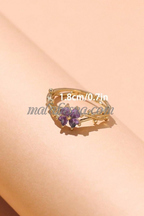 Golden Ring with purple flower