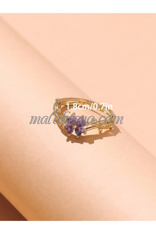 Golden Ring with purple flower