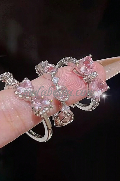 3 Silver Rings set with pink bowknot