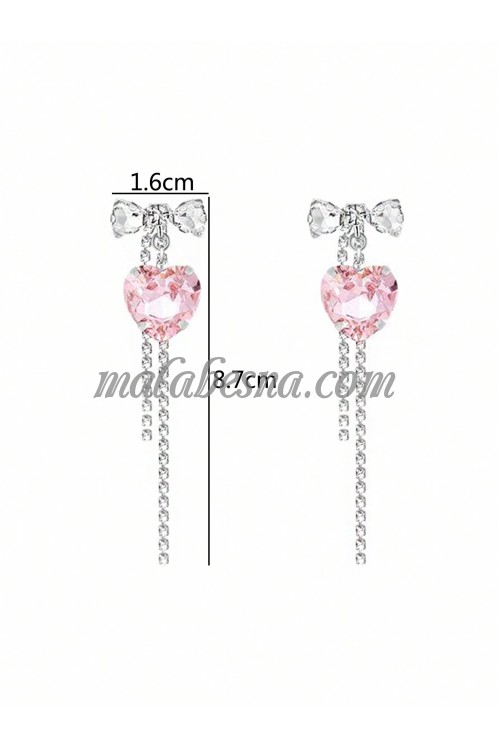 Silver colored heart shaped earring