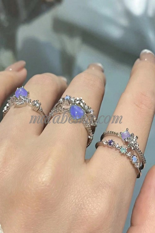 3 purple rings with hearts and diamonds