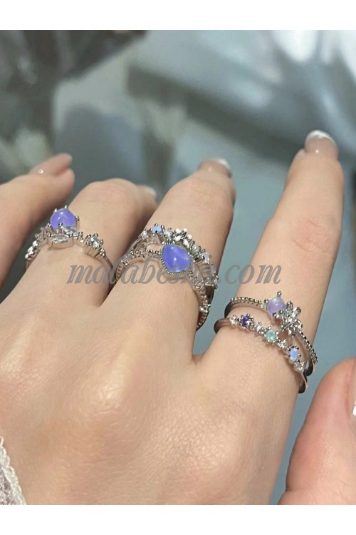 3 purple rings with hearts and diamonds