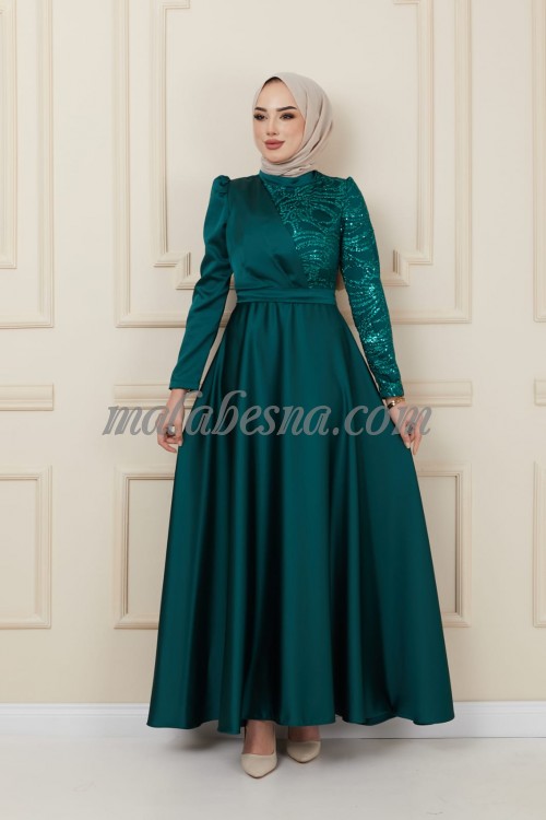 Green evening dress with shining stones on the chest