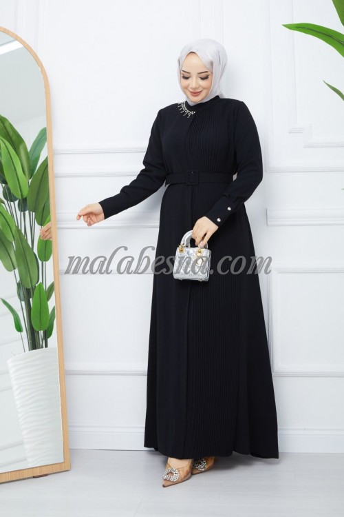 Black bleseh dress with belt and accessories attached on the dress