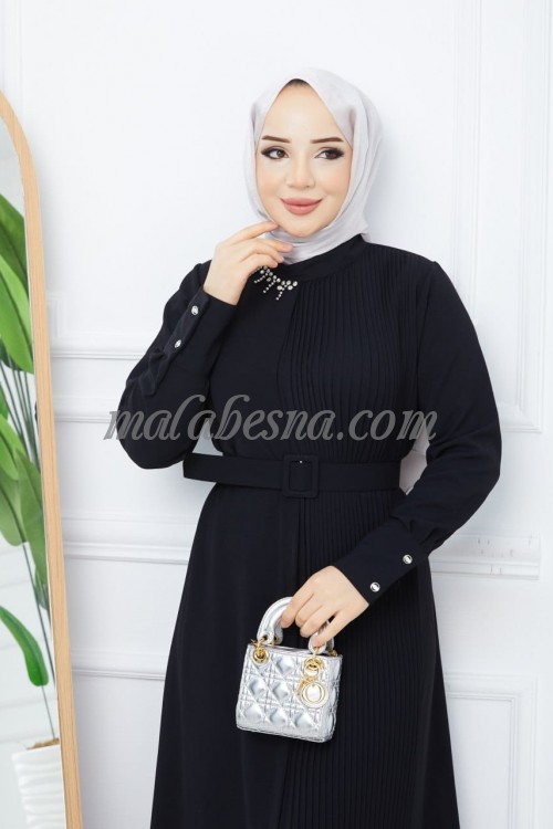 Black bleseh dress with belt and accessories attached on the dress