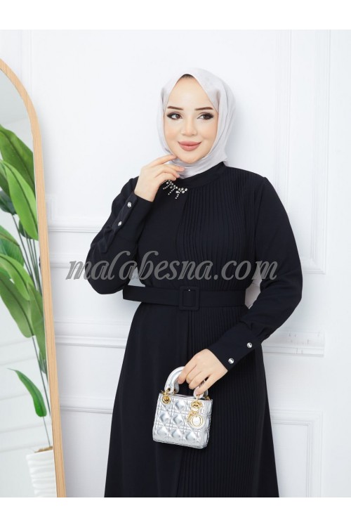 Black bleseh dress with belt and accessories attached on the dress