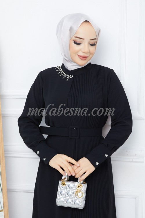 Black bleseh dress with belt and accessories attached on the dress