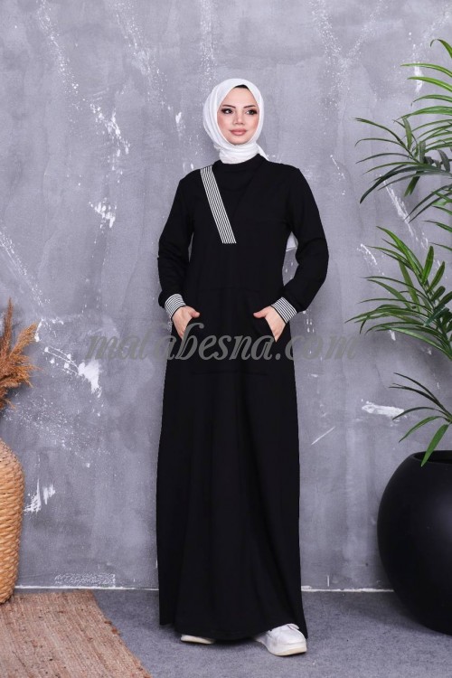 Black sporty abaya with front pockets with white lines on one side from chest