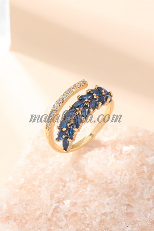 Golden ring with blue Zirconia