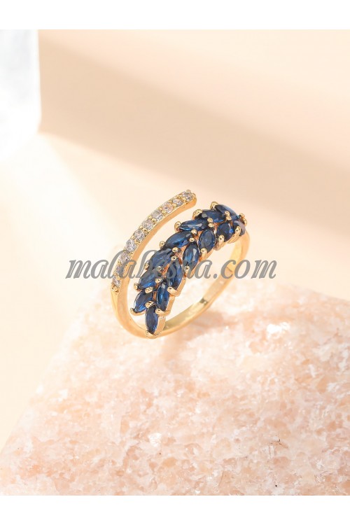 Golden ring with blue Zirconia