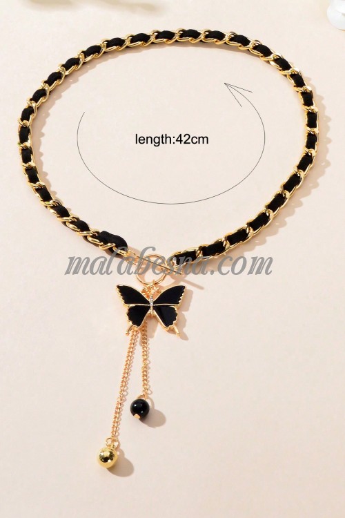 Golden necklace with black chain and butterfly