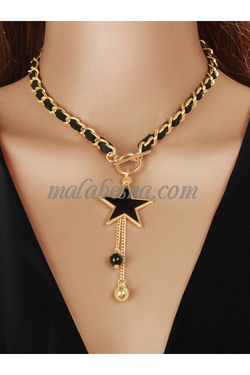 Golden necklace with black chain and star