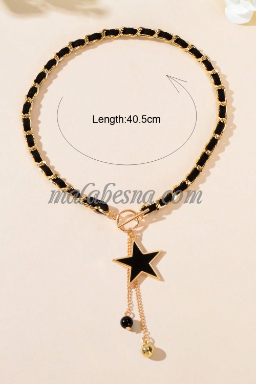 Golden necklace with black chain and star