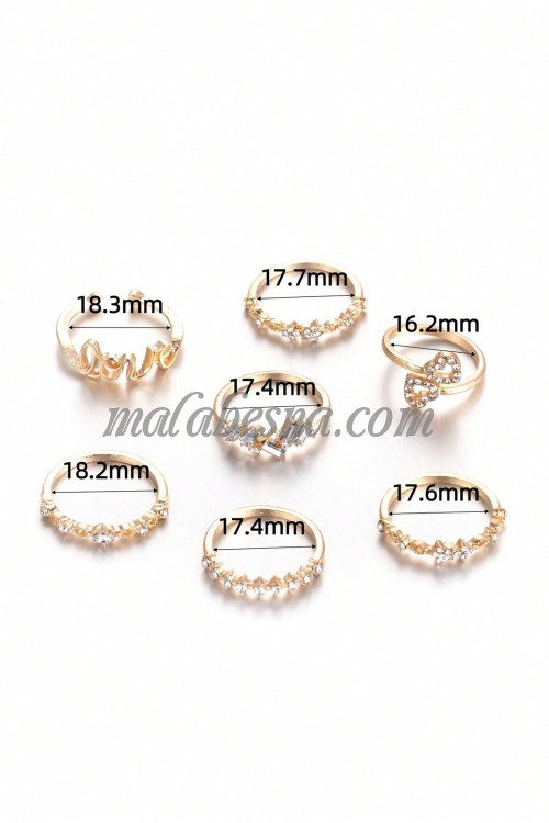 7 golden rings set with various patterns