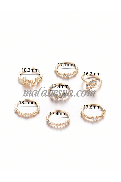 7 golden rings set with various patterns