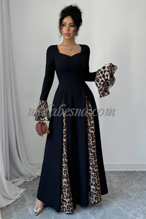 Black dress with tiger pattern below and on the sleeves